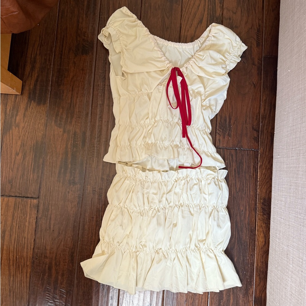 Cream, ruffled set with Red Tie Accent